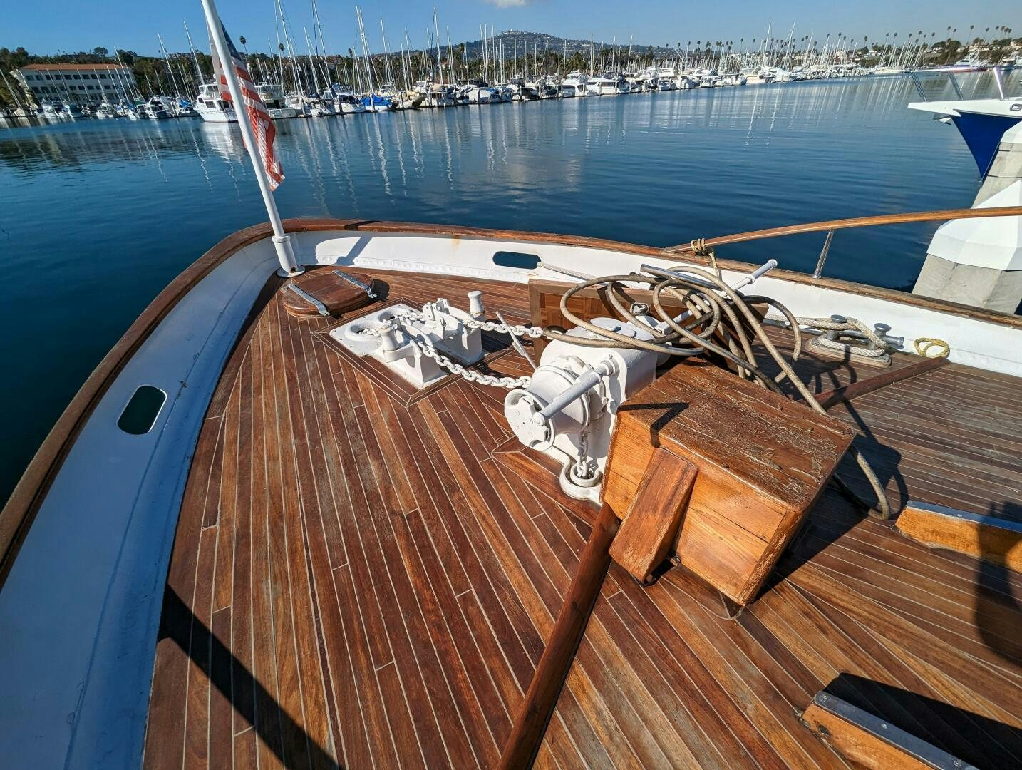 a deck with a view of a city and a body of water aboard ISABELLA Yacht for Sale