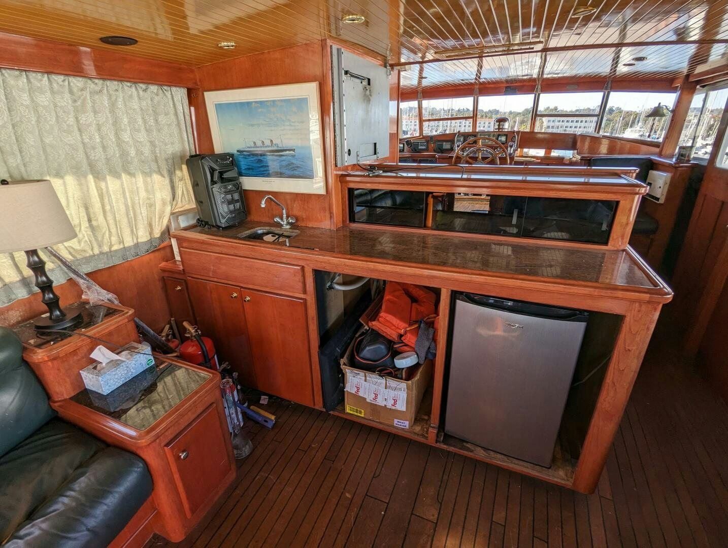 a kitchen with wooden cabinets aboard ISABELLA Yacht for Sale