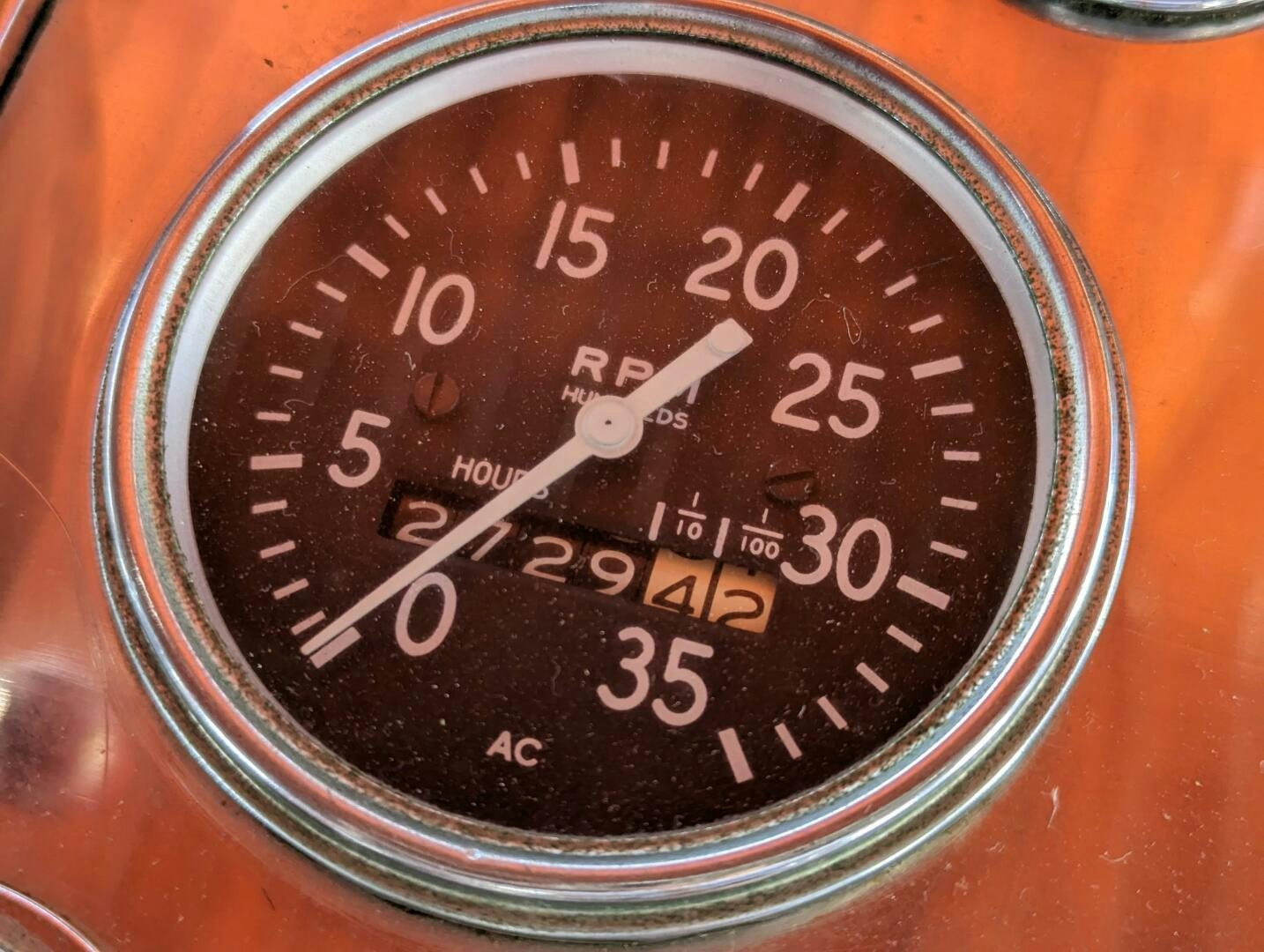 a round brown object with white text aboard ISABELLA Yacht for Sale