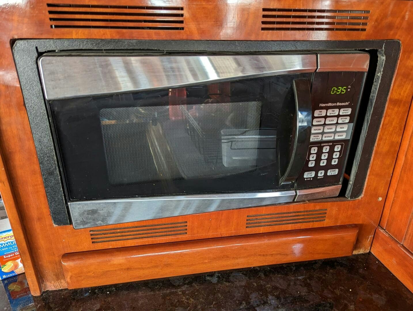 a microwave oven is open aboard ISABELLA Yacht for Sale