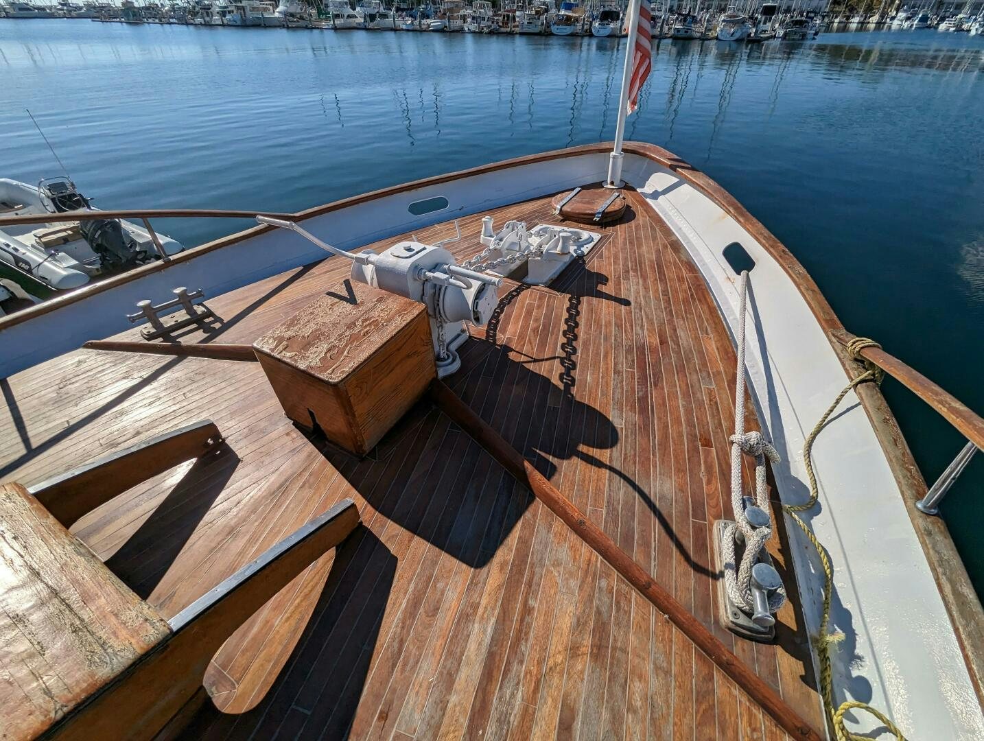 a wooden boat on a dock aboard ISABELLA Yacht for Sale