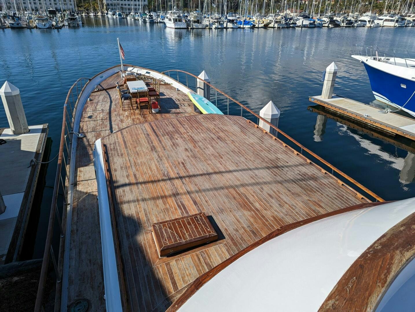 a large wooden boat on a body of water aboard ISABELLA Yacht for Sale