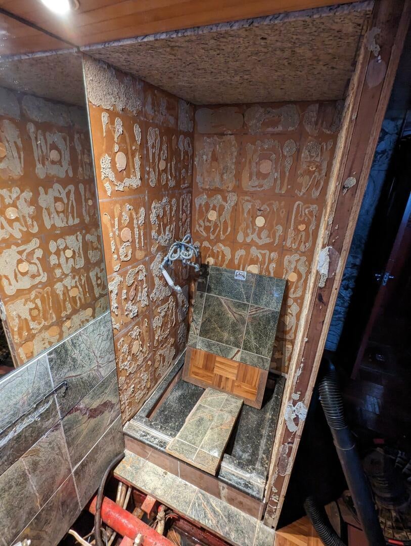 a room with a wall with a painting on it aboard ISABELLA Yacht for Sale