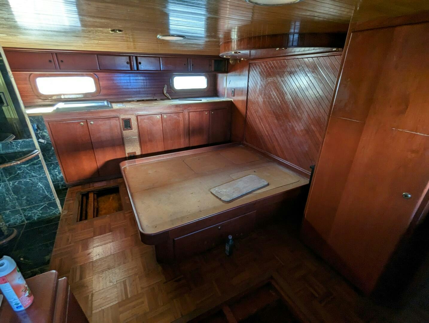 a kitchen with wooden cabinets aboard ISABELLA Yacht for Sale