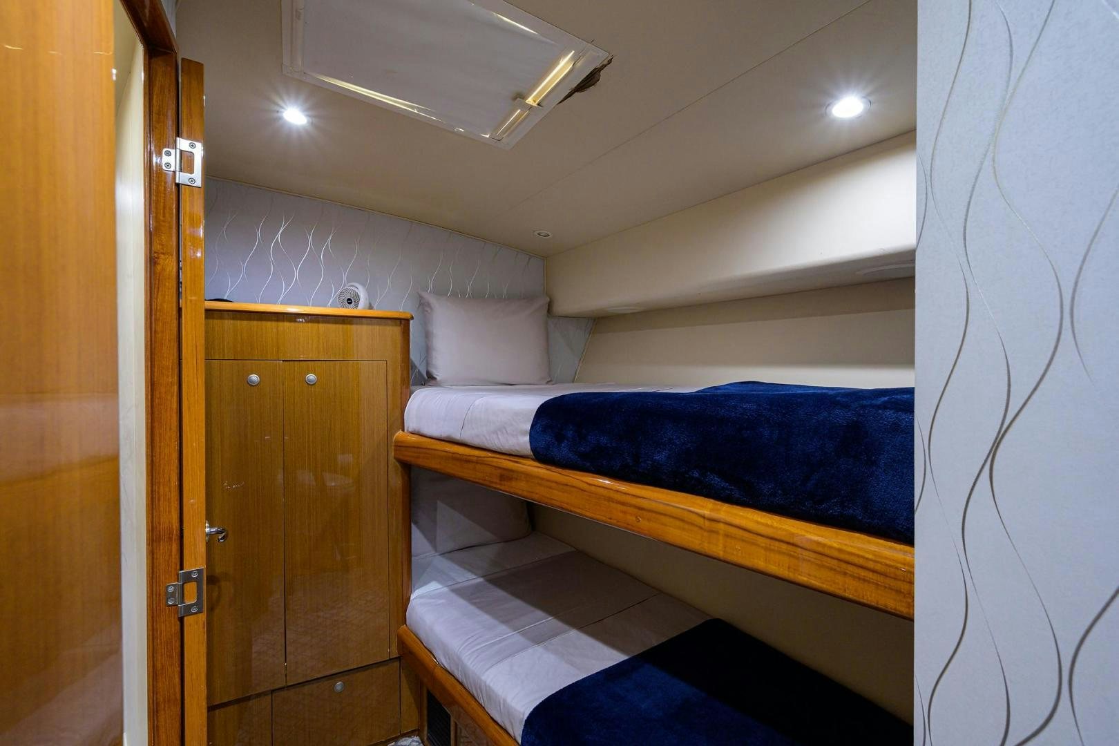 a bed in a room aboard VAGRANT Yacht for Sale