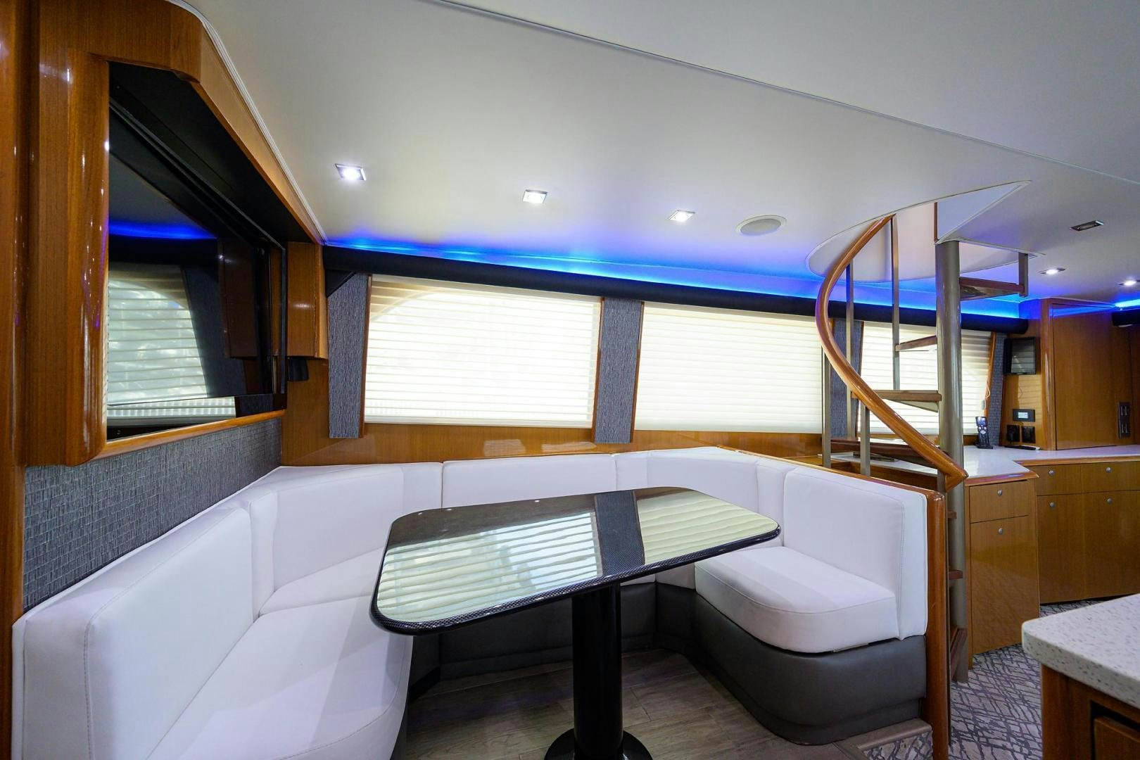 a room with a table and chairs aboard VAGRANT Yacht for Sale