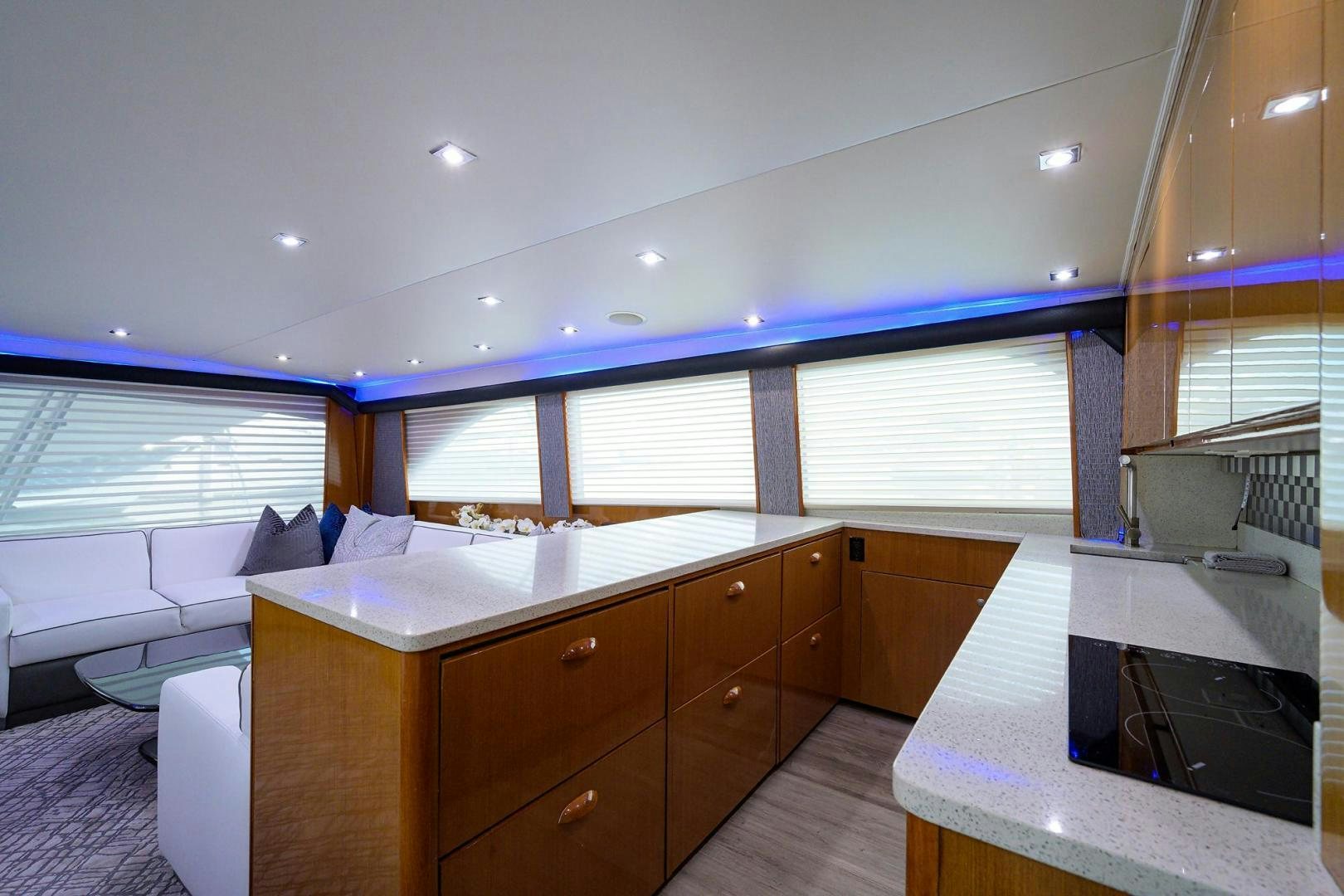 a room with a large window and a bed in it aboard VAGRANT Yacht for Sale