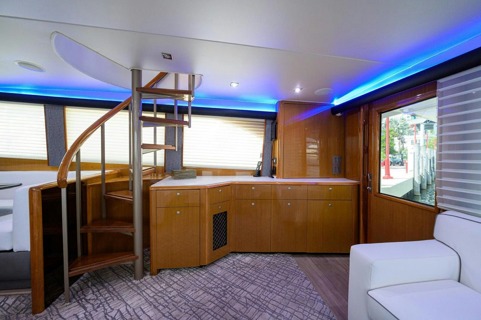 a room with a bed and a window aboard VAGRANT Yacht for Sale