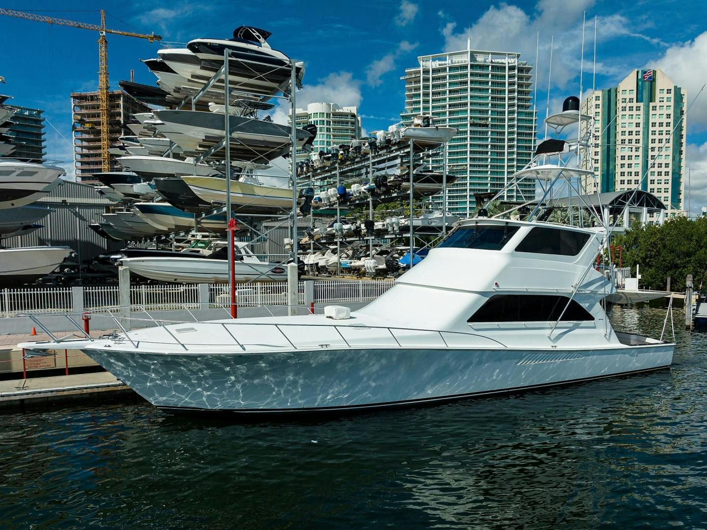 a boat docked at a pier aboard VAGRANT Yacht for Sale