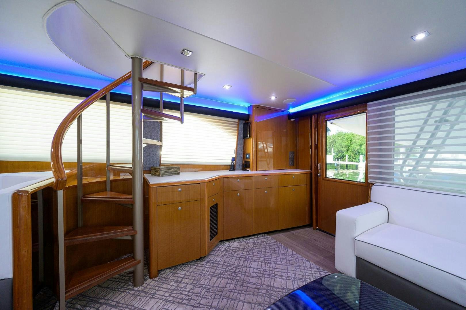 a room with a bed and a couch aboard VAGRANT Yacht for Sale