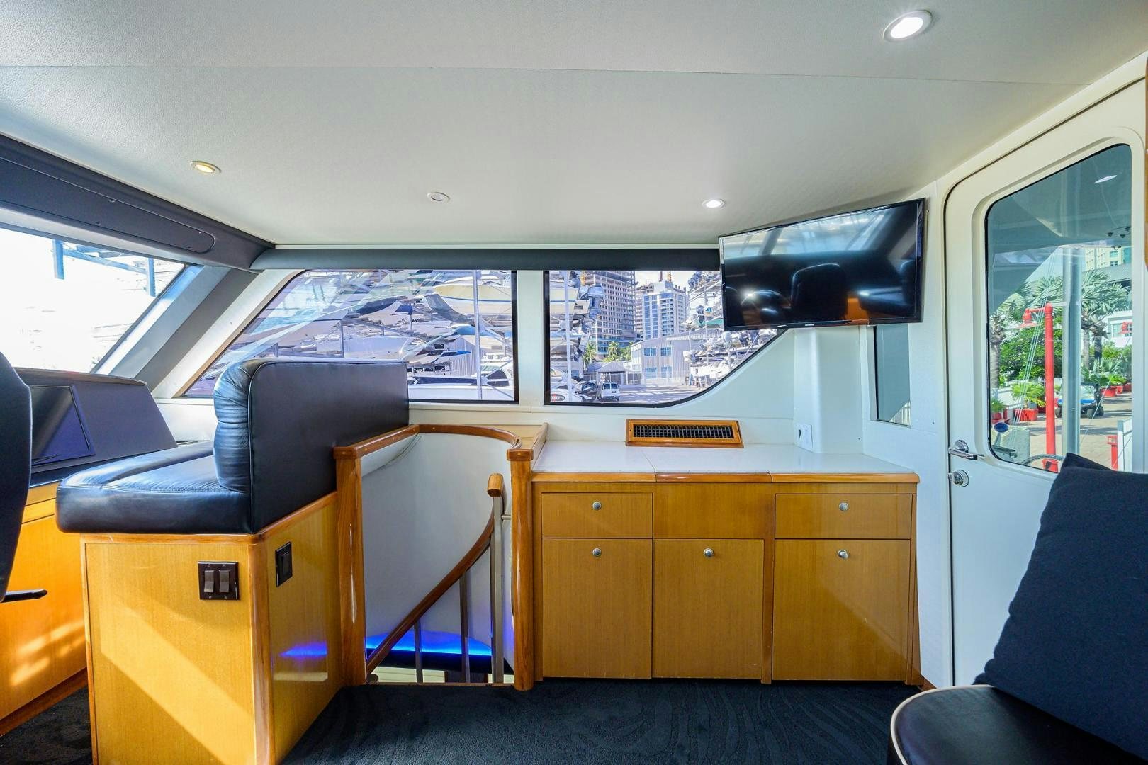 a room with a desk and a tv aboard VAGRANT Yacht for Sale