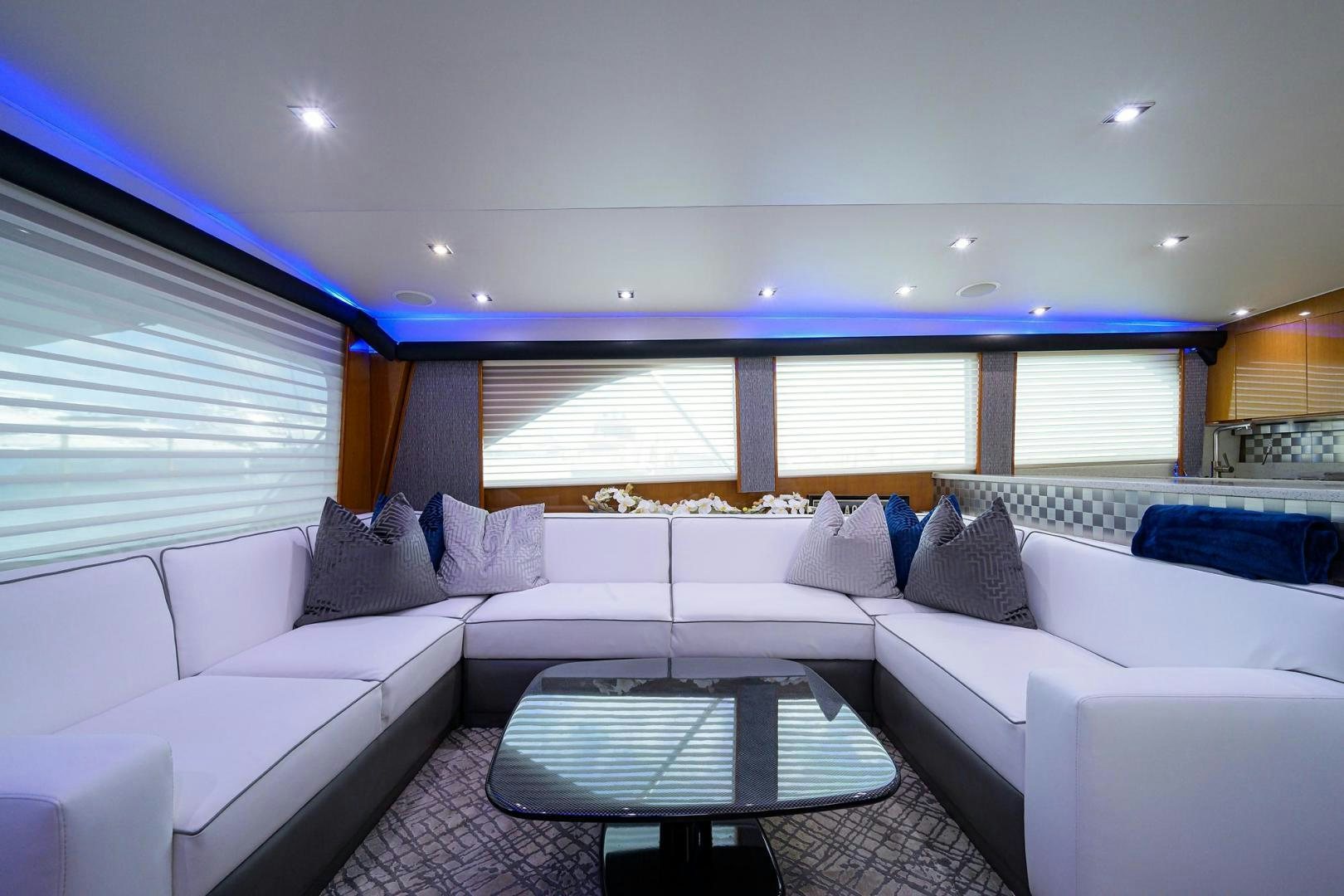 a living room with a couch and a table aboard VAGRANT Yacht for Sale