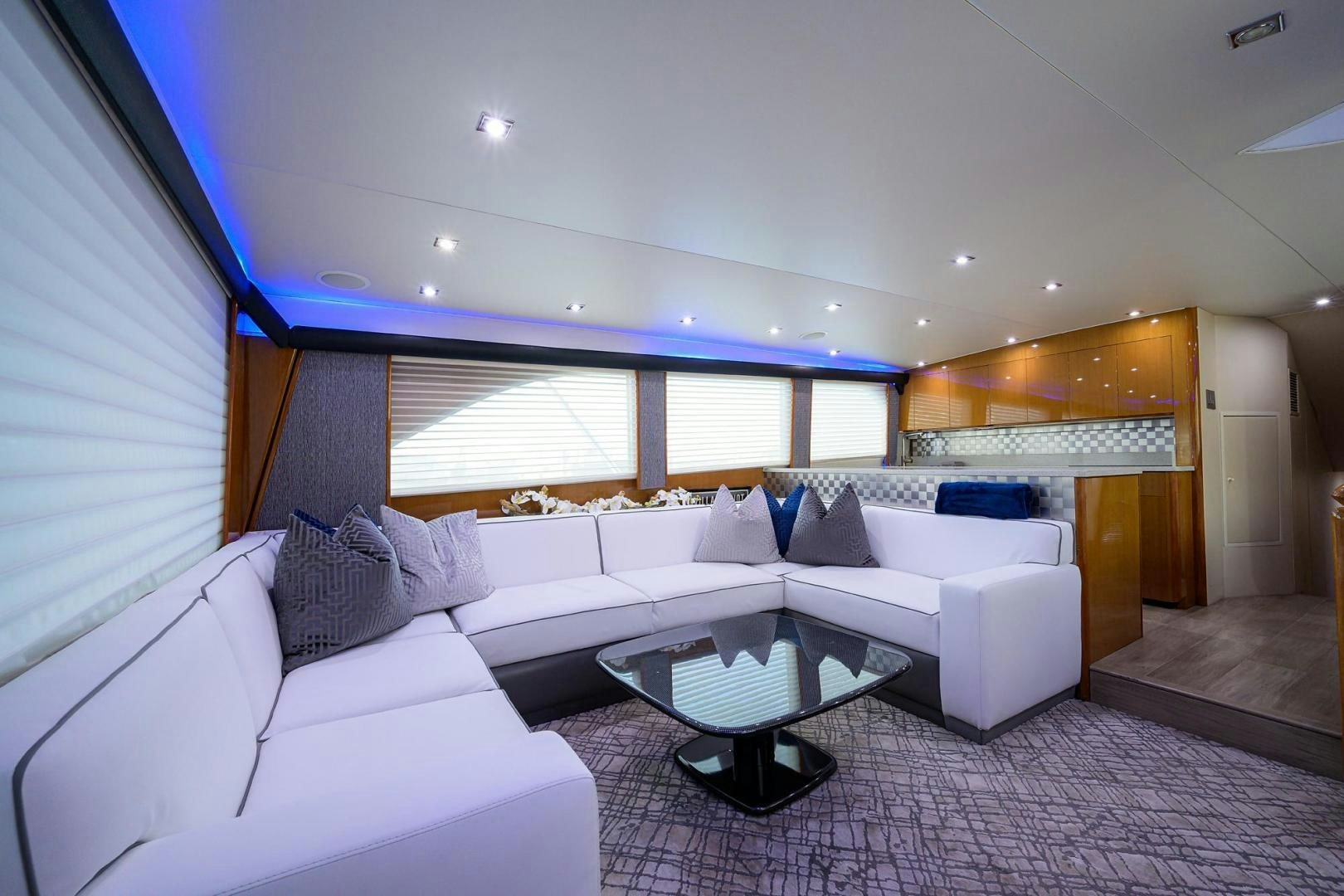a room with a couch and a table aboard VAGRANT Yacht for Sale