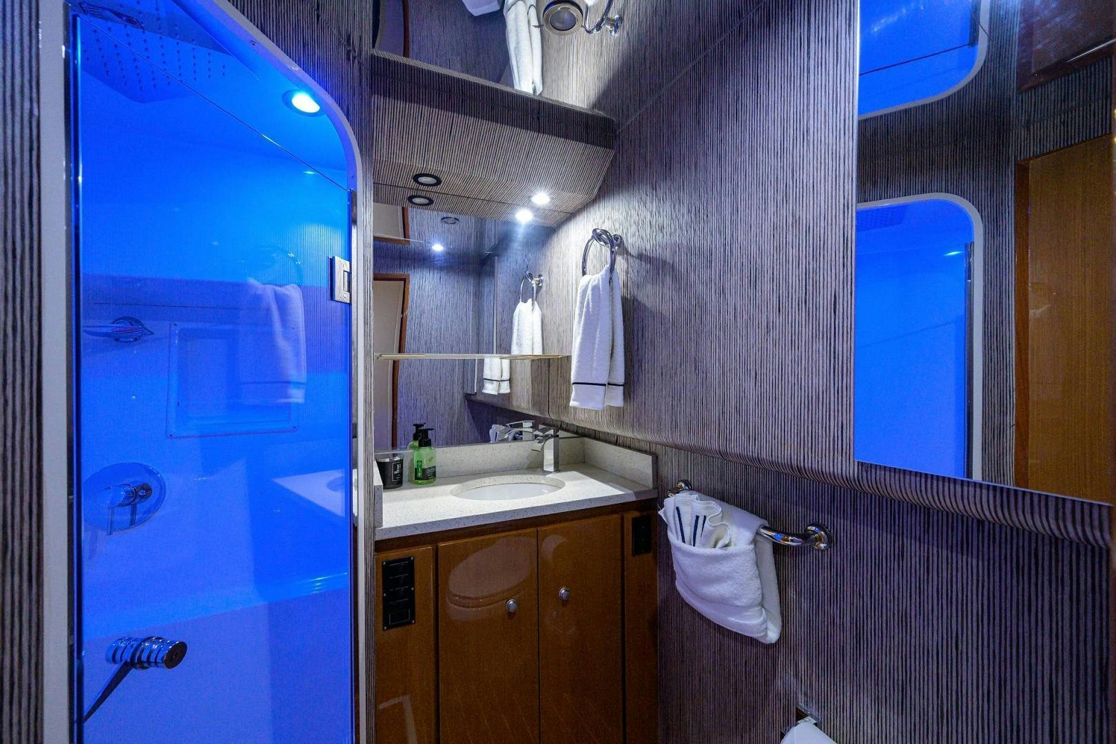 a bathroom with a large mirror aboard VAGRANT Yacht for Sale