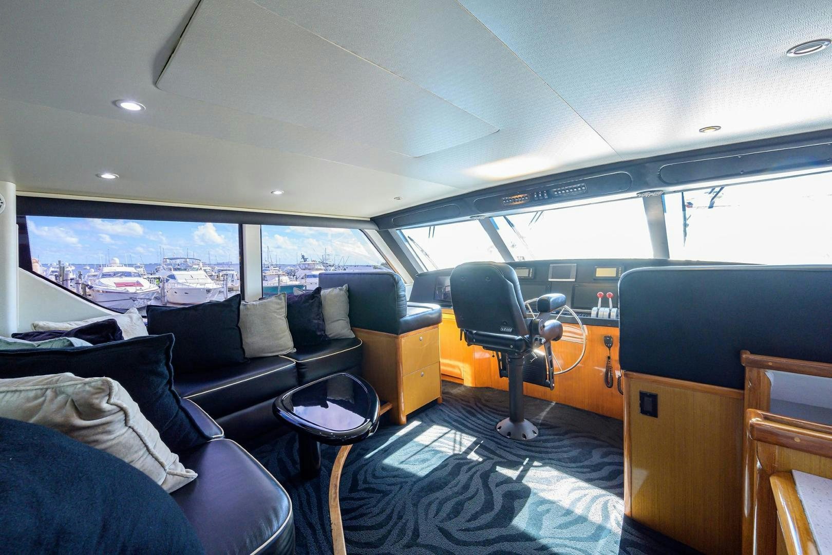 a room with a couch and a chair aboard VAGRANT Yacht for Sale