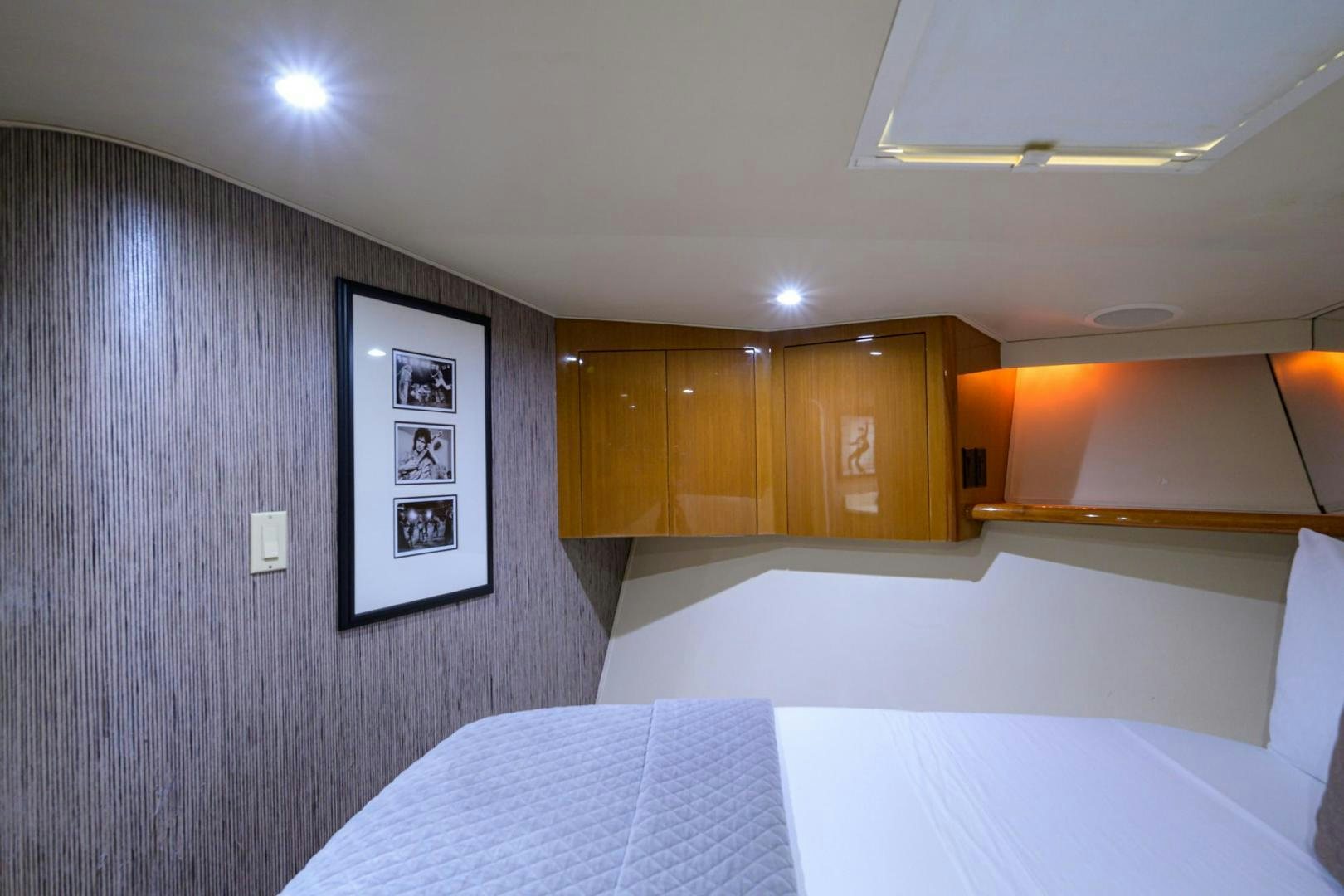 a room with a couple of beds aboard VAGRANT Yacht for Sale