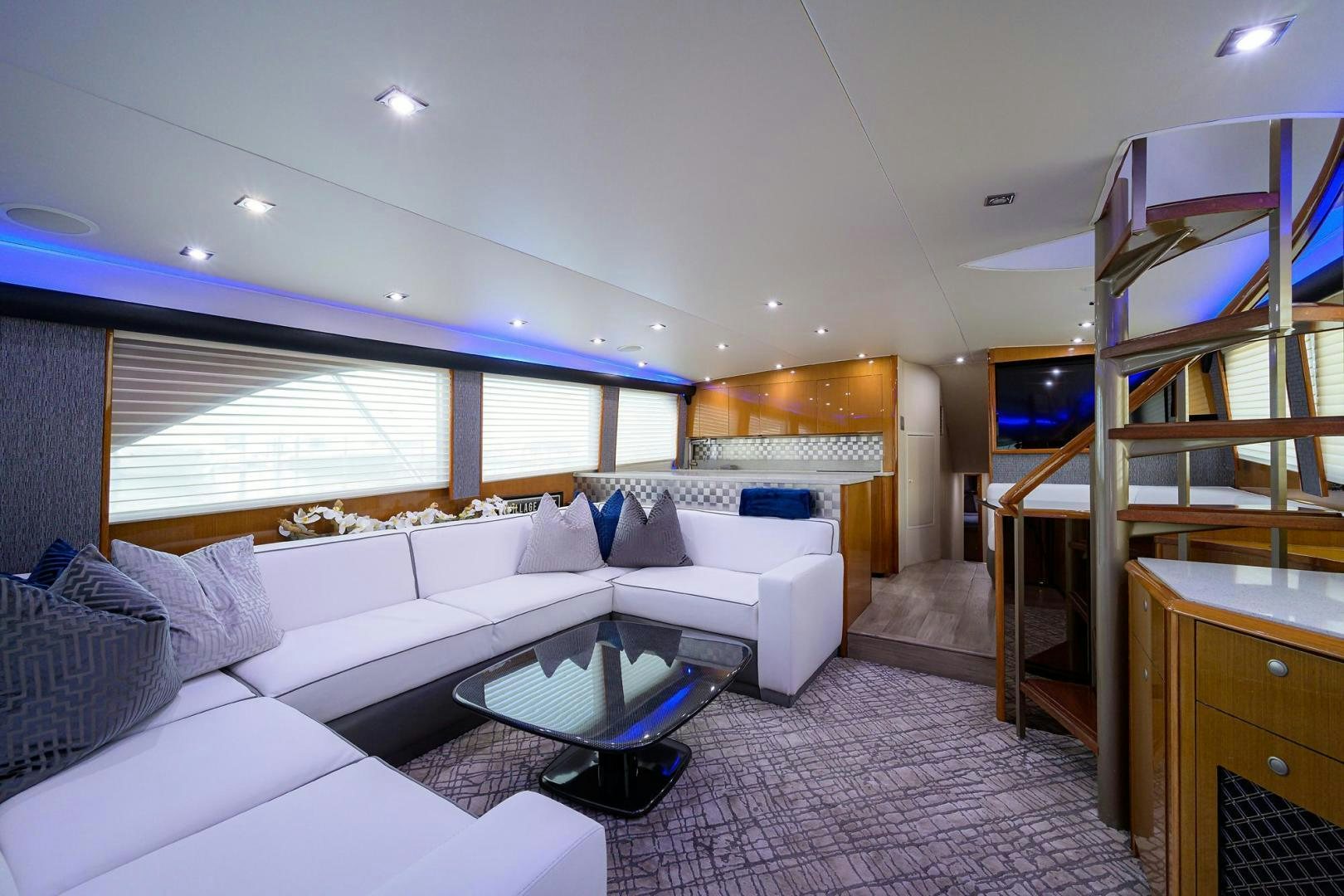 a room with a bed and a table aboard VAGRANT Yacht for Sale