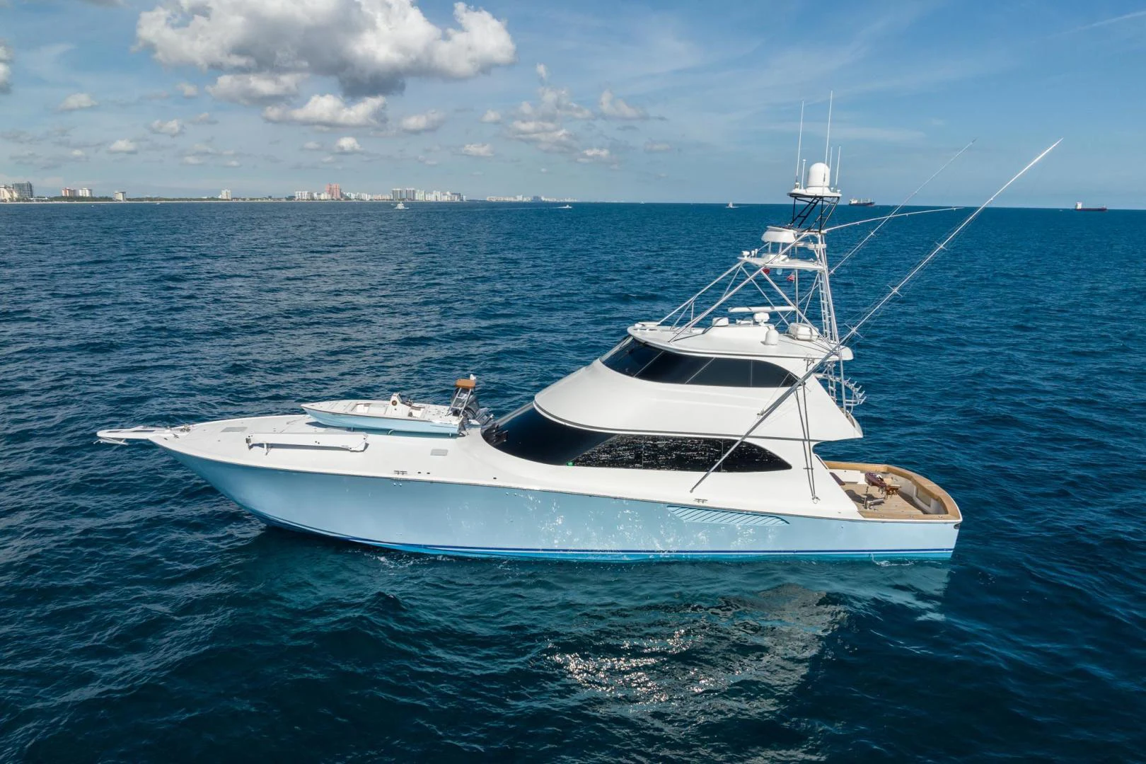 a white yacht in the water aboard PANACEA Yacht for Sale