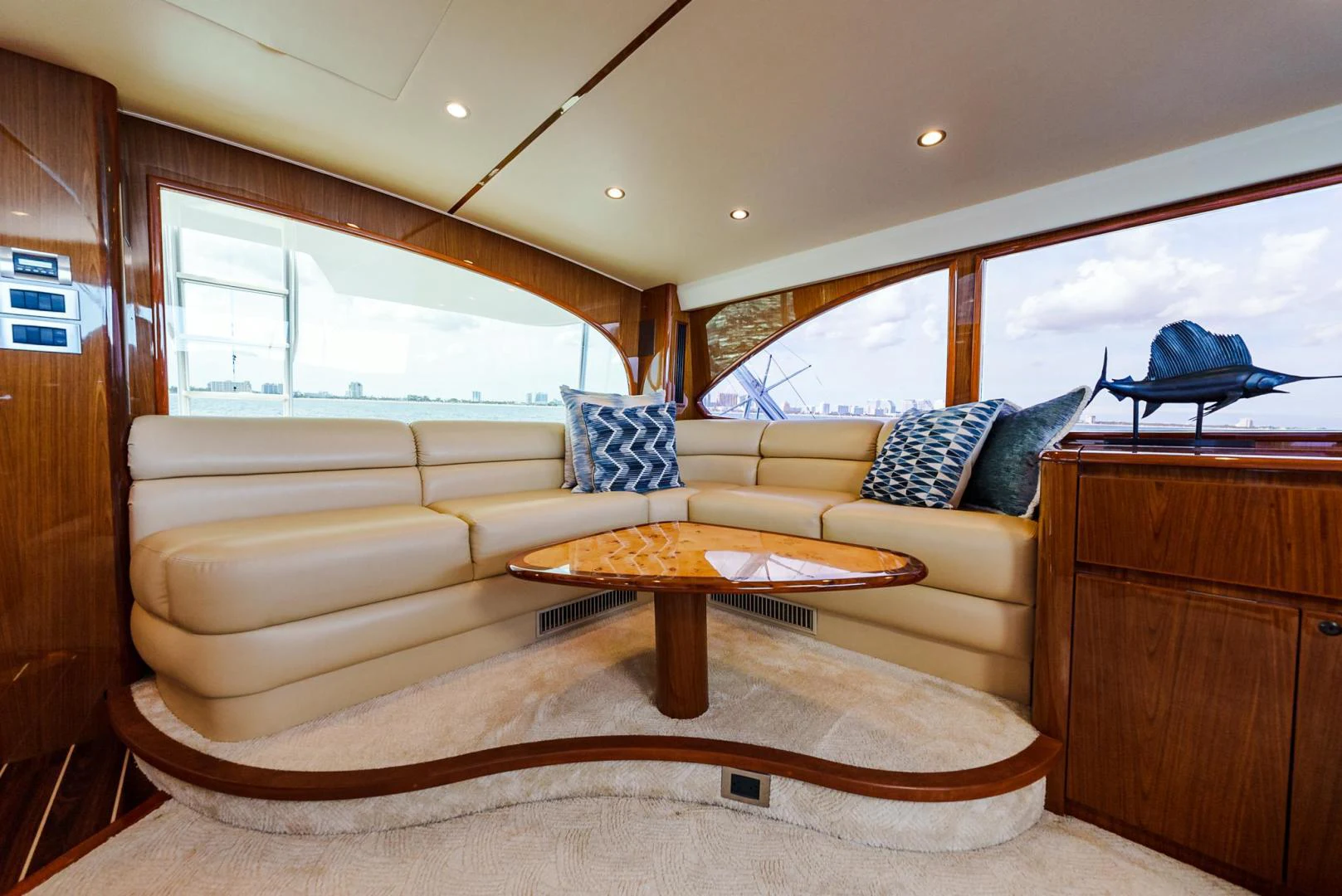 a living room with a couch and a coffee table aboard PANACEA Yacht for Sale