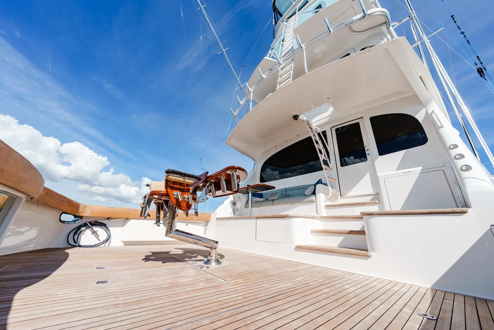 a boat with a ladder and a boat on the deck aboard PANACEA Yacht for Sale