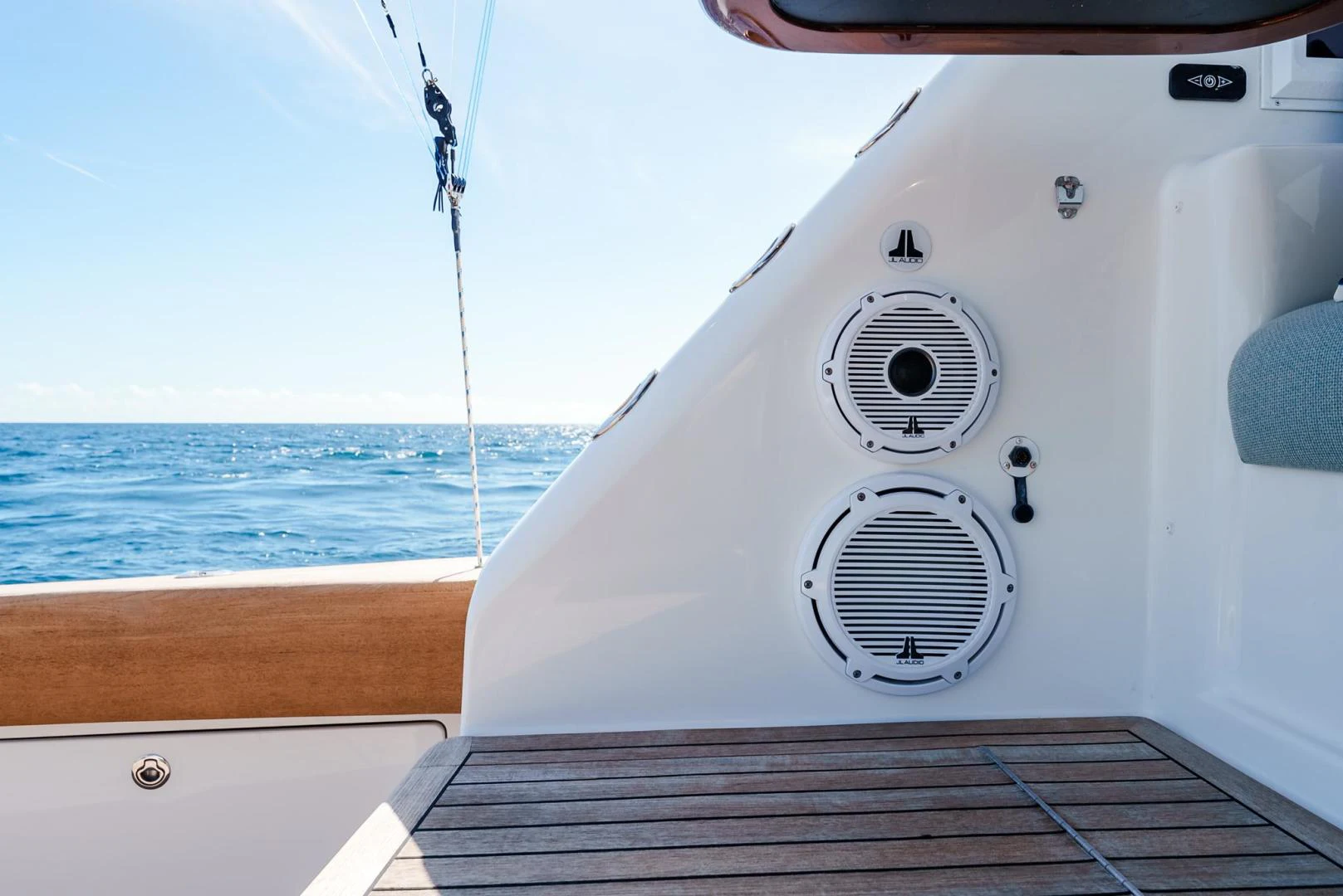 a white boat on a body of water aboard PANACEA Yacht for Sale