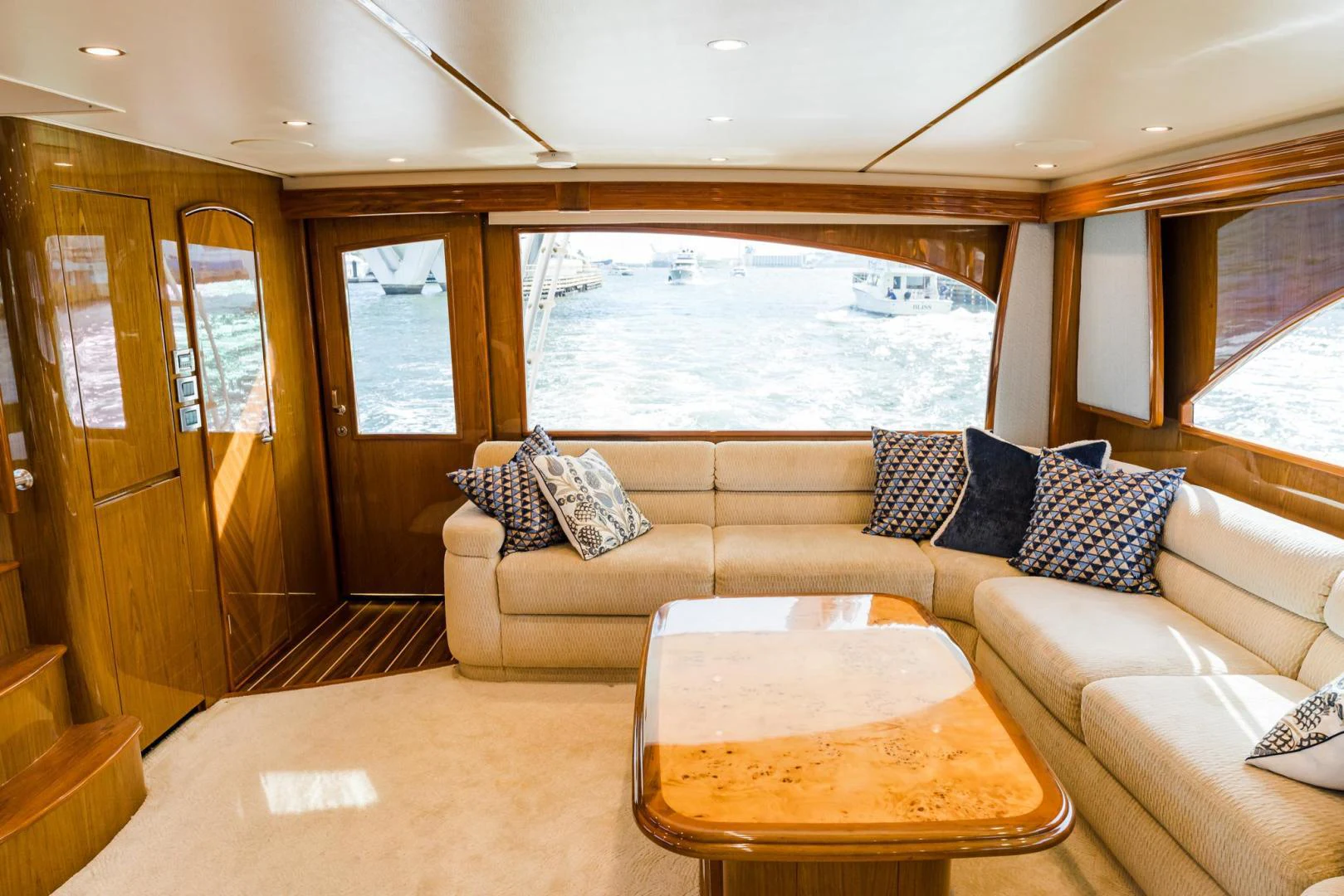 a living room with a large window aboard PANACEA Yacht for Sale