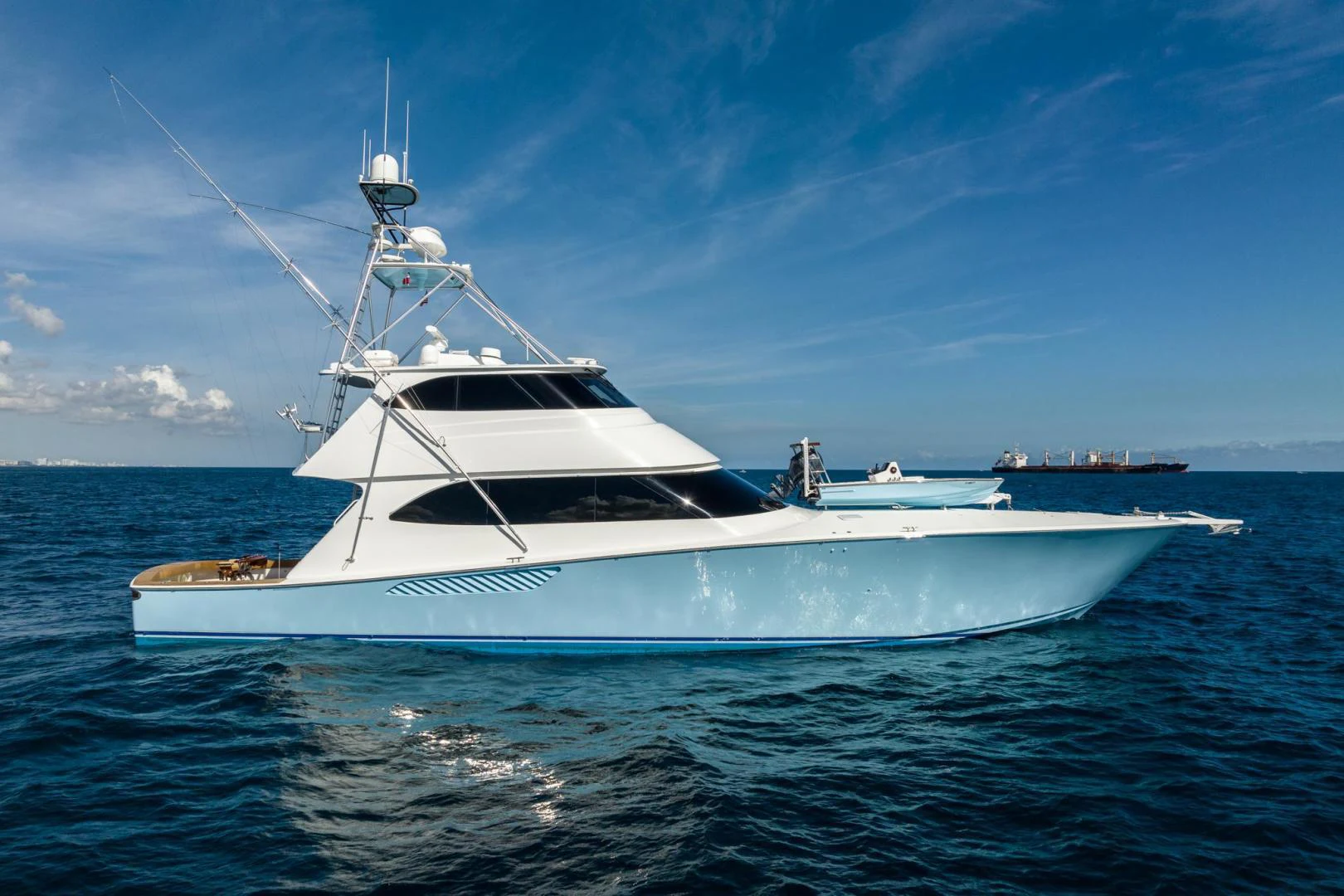 a white yacht in the water aboard PANACEA Yacht for Sale
