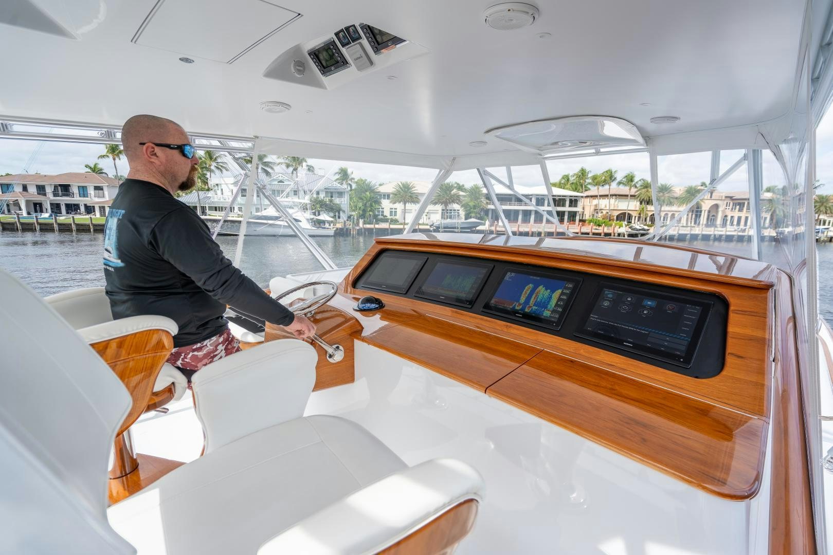 a person playing a piano aboard TANGAROA Yacht for Sale