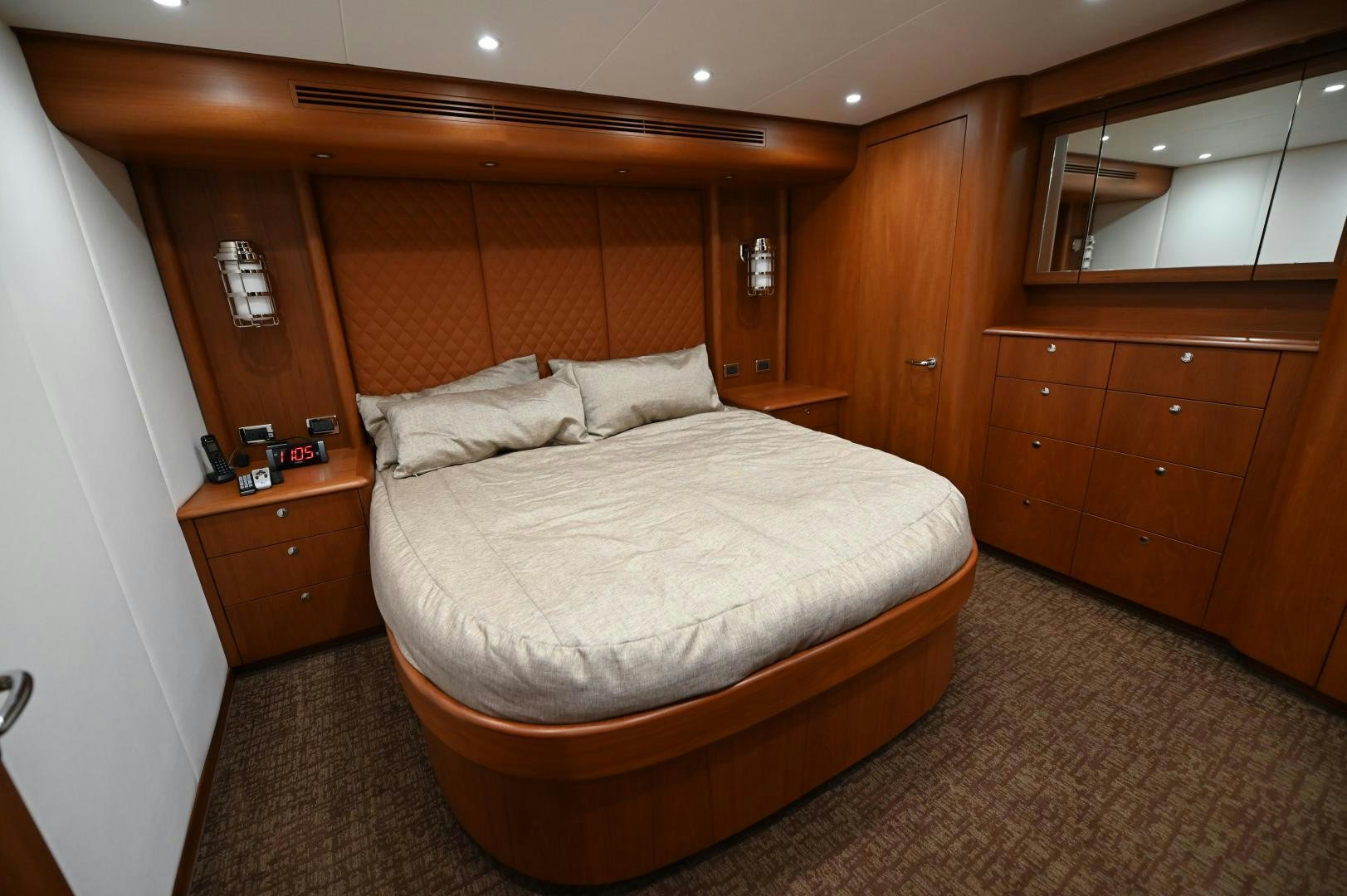 a bed in a room aboard TANGAROA Yacht for Sale
