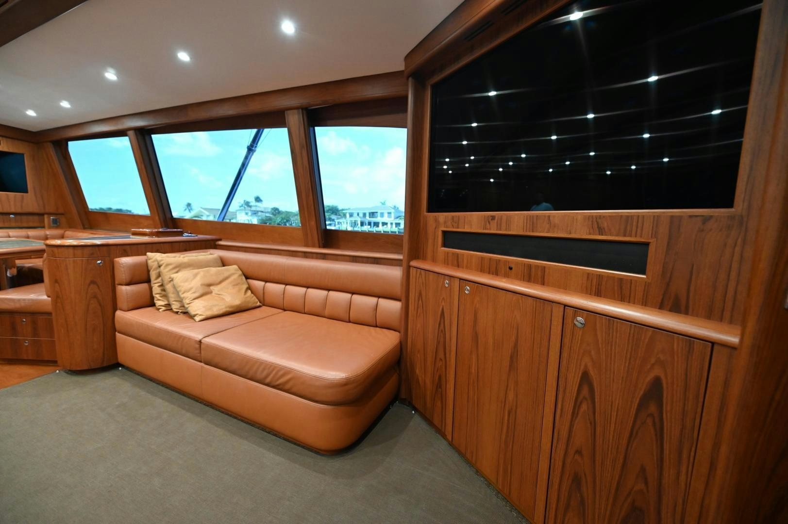 a room with a couch and a window aboard TANGAROA Yacht for Sale