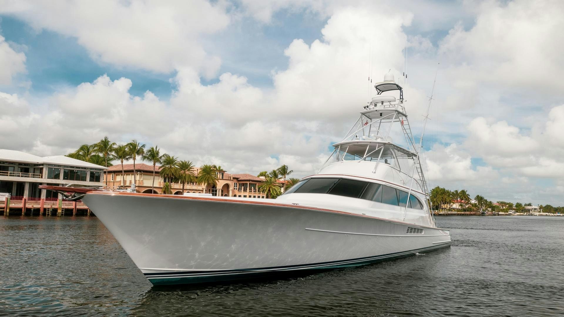 a white boat on the water aboard TANGAROA Yacht for Sale