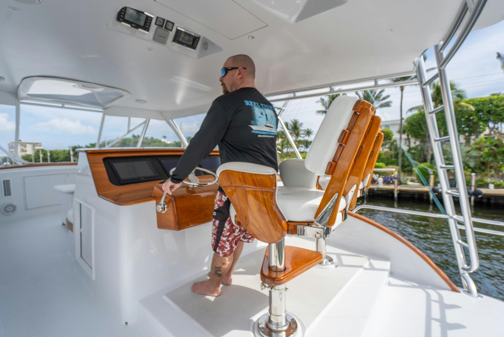 a person standing on a boat aboard TANGAROA Yacht for Sale