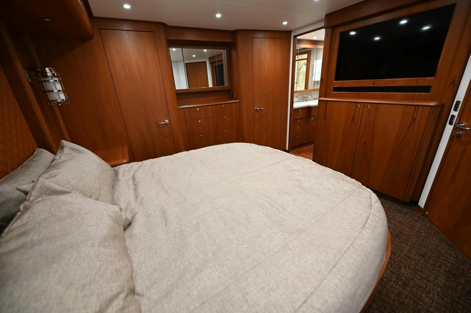 a bed in a room aboard TANGAROA Yacht for Sale