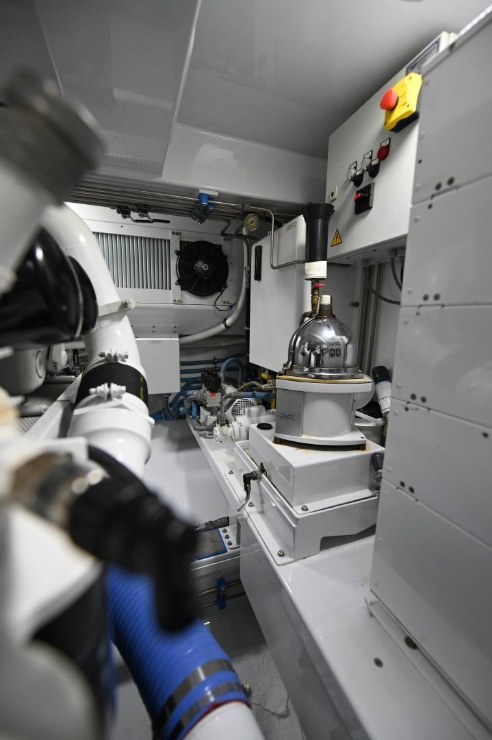 a machine in a room aboard TANGAROA Yacht for Sale