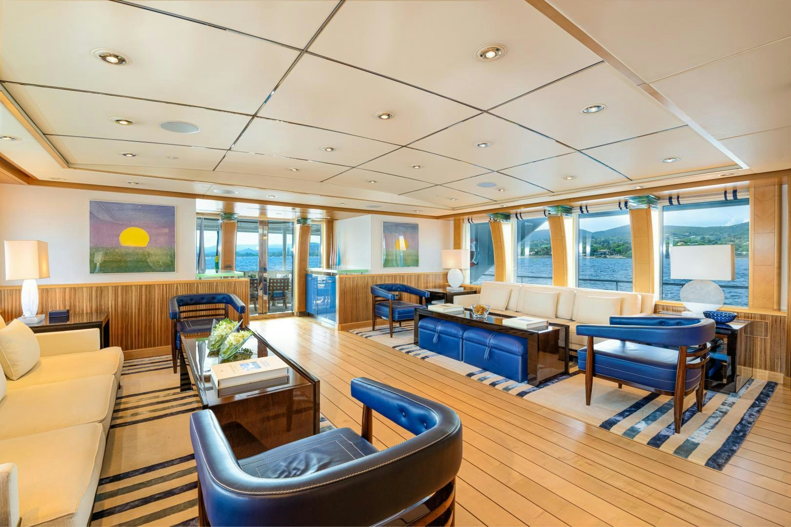 a living room with a large window aboard VICTORIA DEL MAR Yacht for Sale