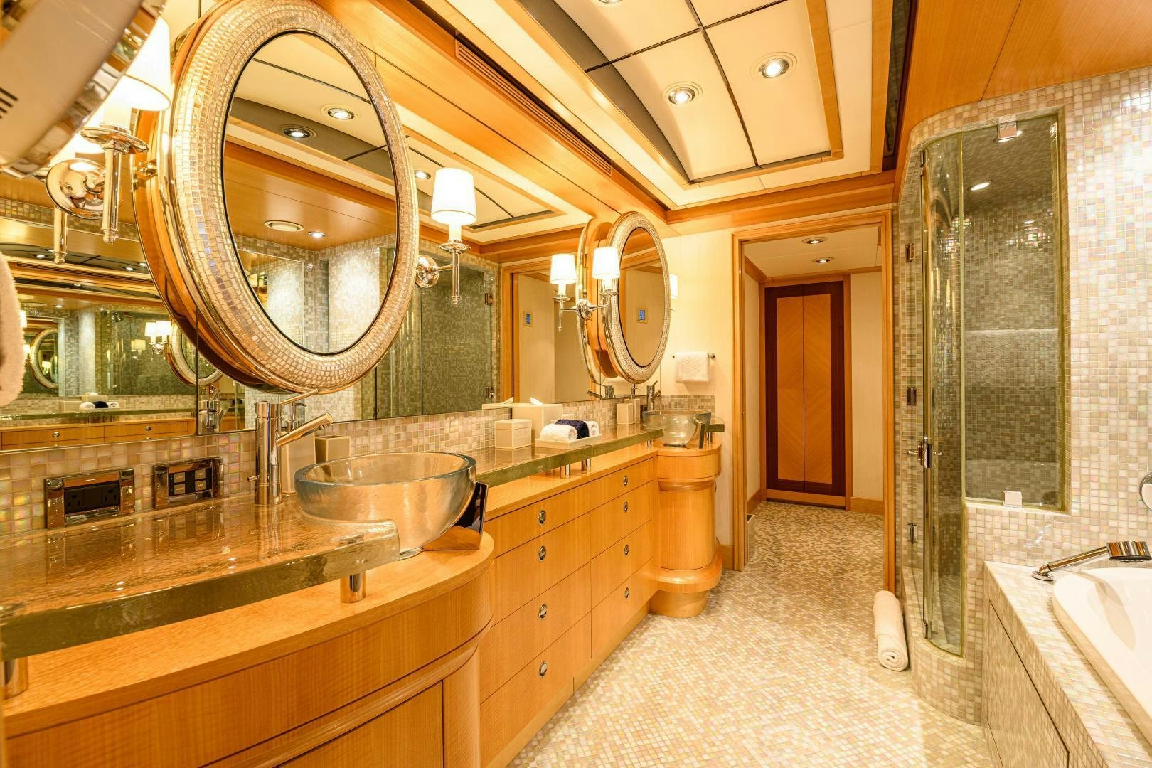 a bathroom with a large mirror aboard VICTORIA DEL MAR Yacht for Sale