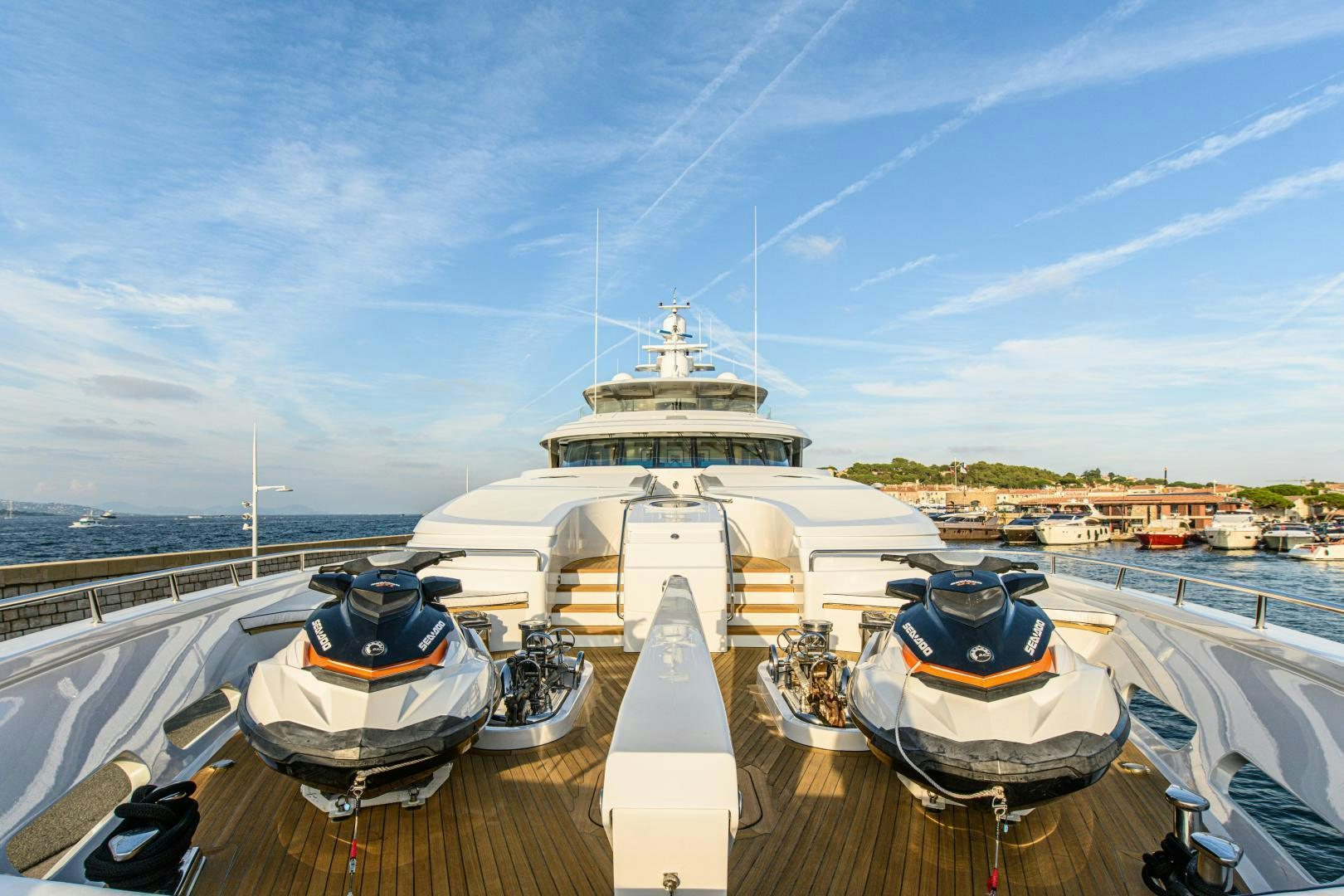 a large cruise ship docked at a pier aboard VICTORIA DEL MAR Yacht for Sale