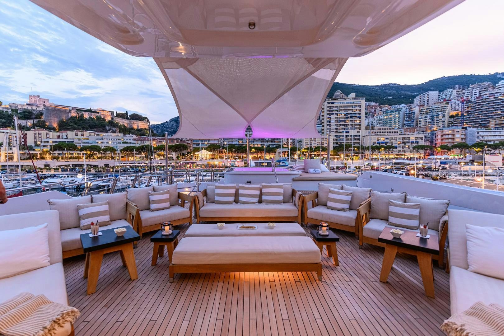 a room with a view of a city and a river aboard VICTORIA DEL MAR Yacht for Sale