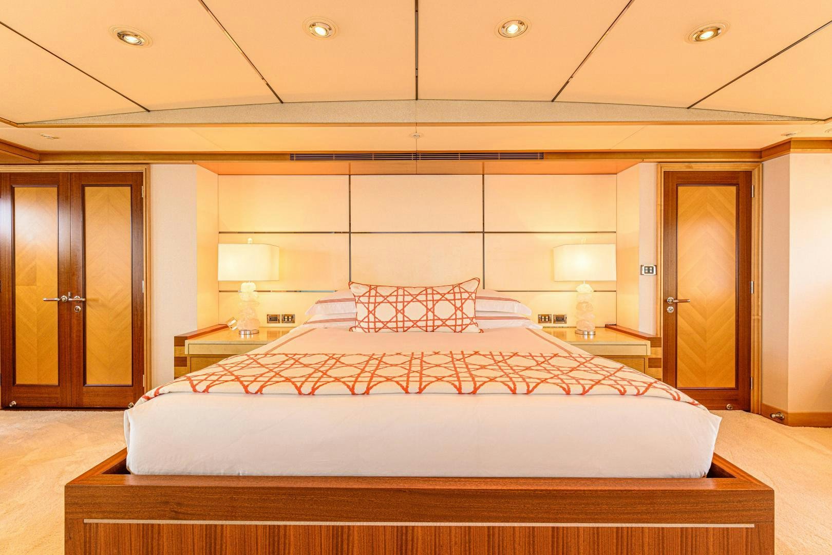 a large bed in a hotel room aboard VICTORIA DEL MAR Yacht for Sale