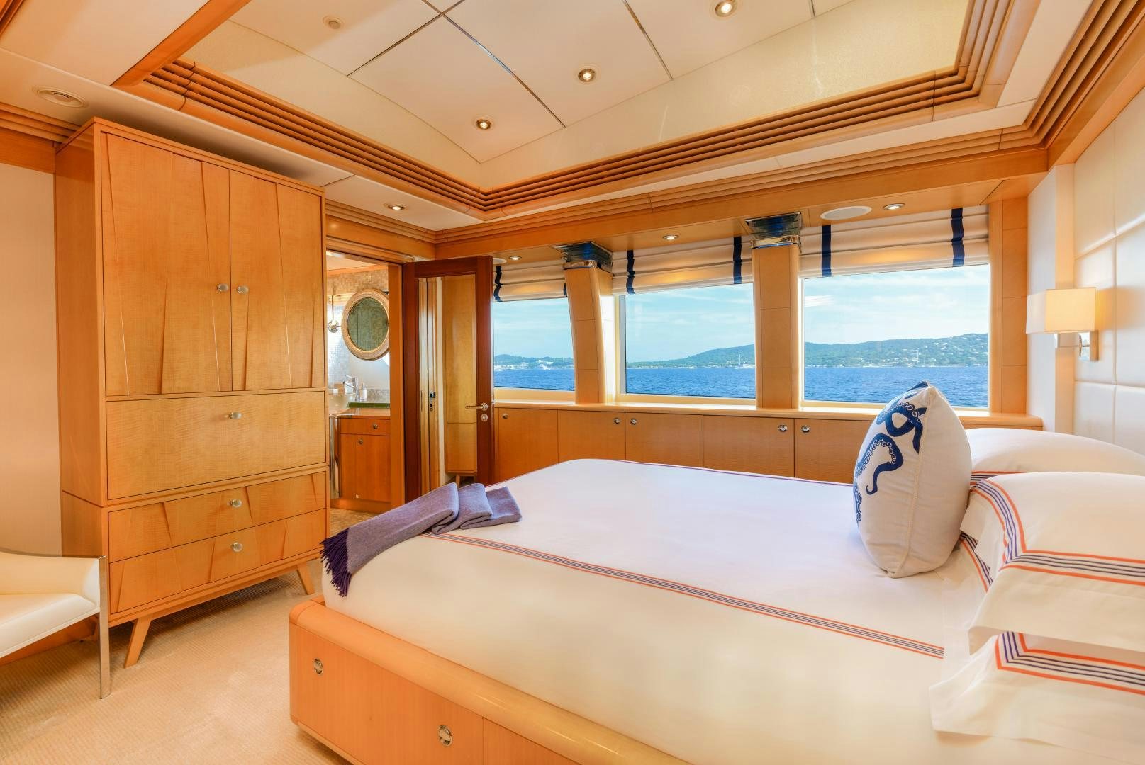 a bed in a room aboard VICTORIA DEL MAR Yacht for Sale