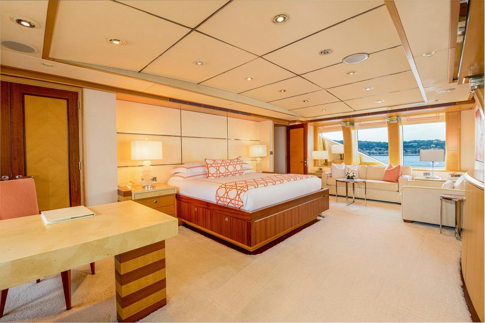 a large bedroom with a large bed aboard VICTORIA DEL MAR Yacht for Sale