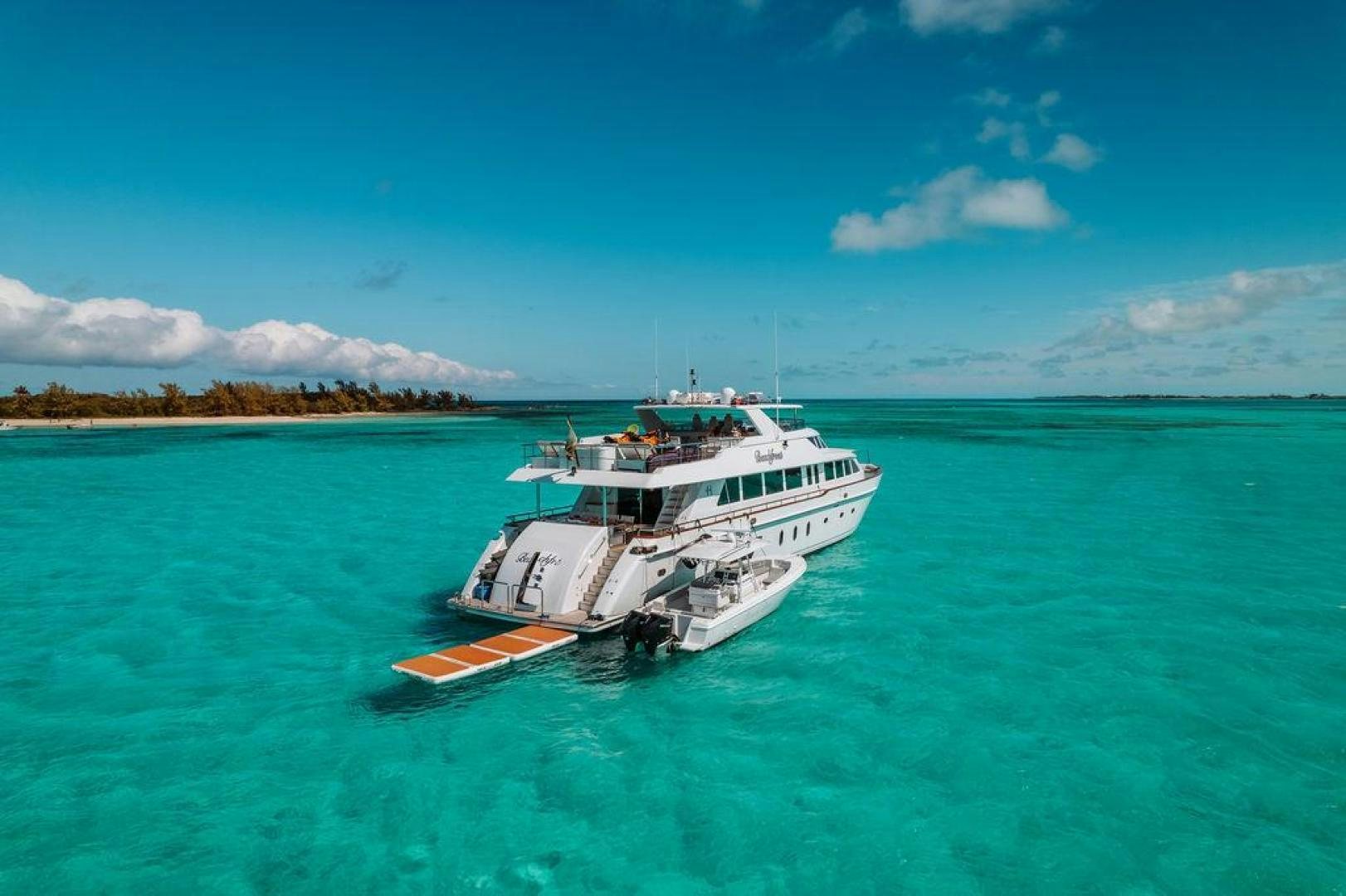 a boat in the water aboard BEACHFRONT Yacht for Sale