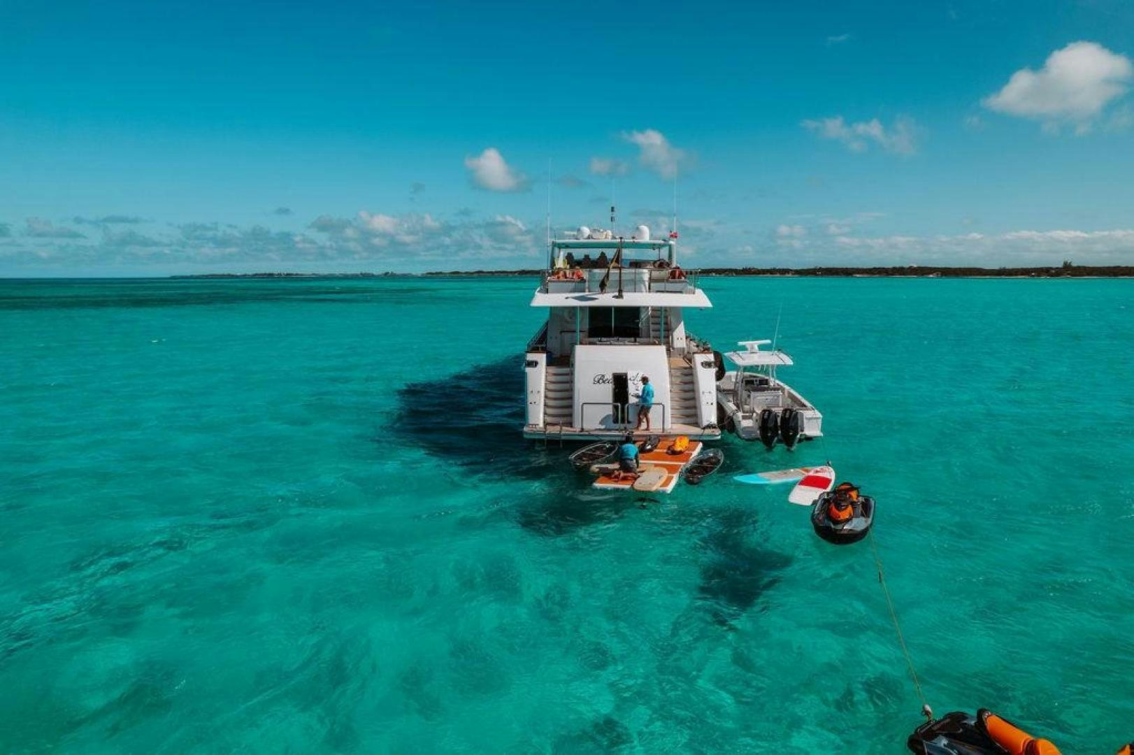 a boat in the water aboard BEACHFRONT Yacht for Sale