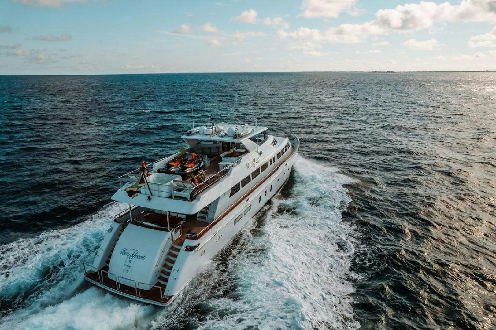 a boat on the water aboard BEACHFRONT Yacht for Sale
