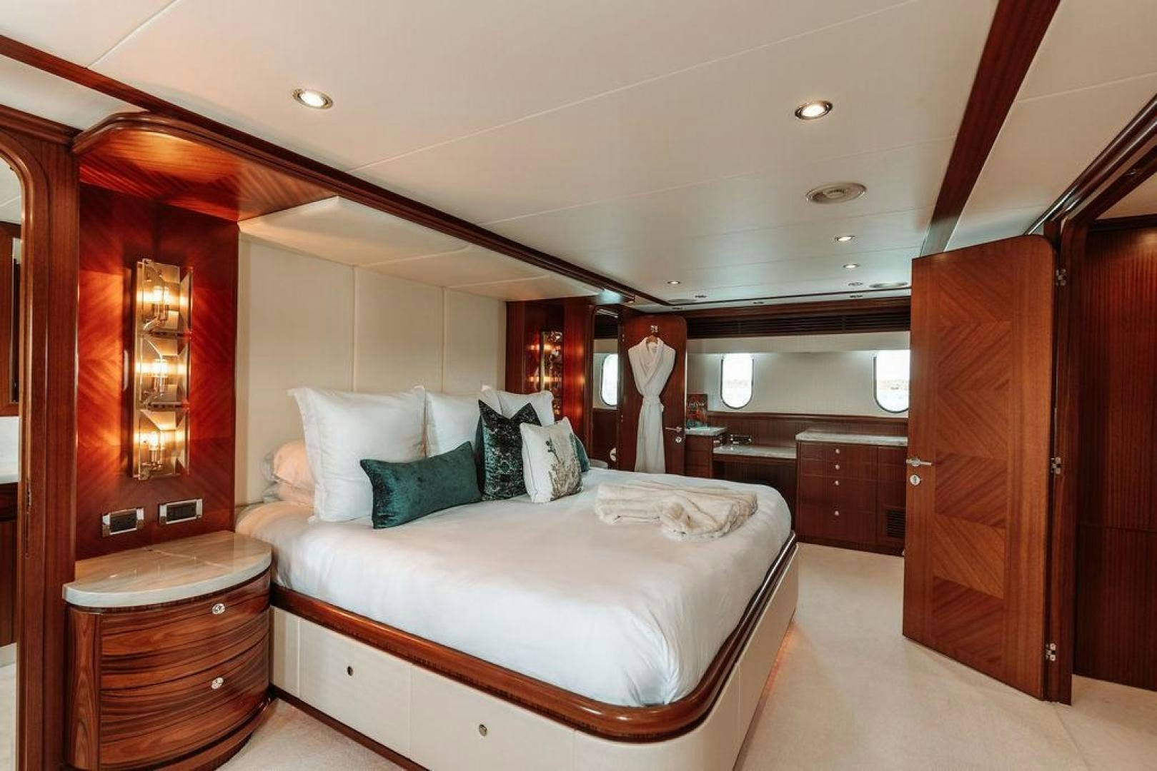 a bed in a room aboard BEACHFRONT Yacht for Sale
