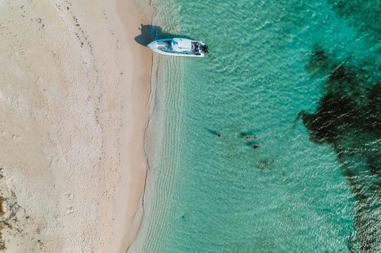 a boat in the water aboard BEACHFRONT Yacht for Sale