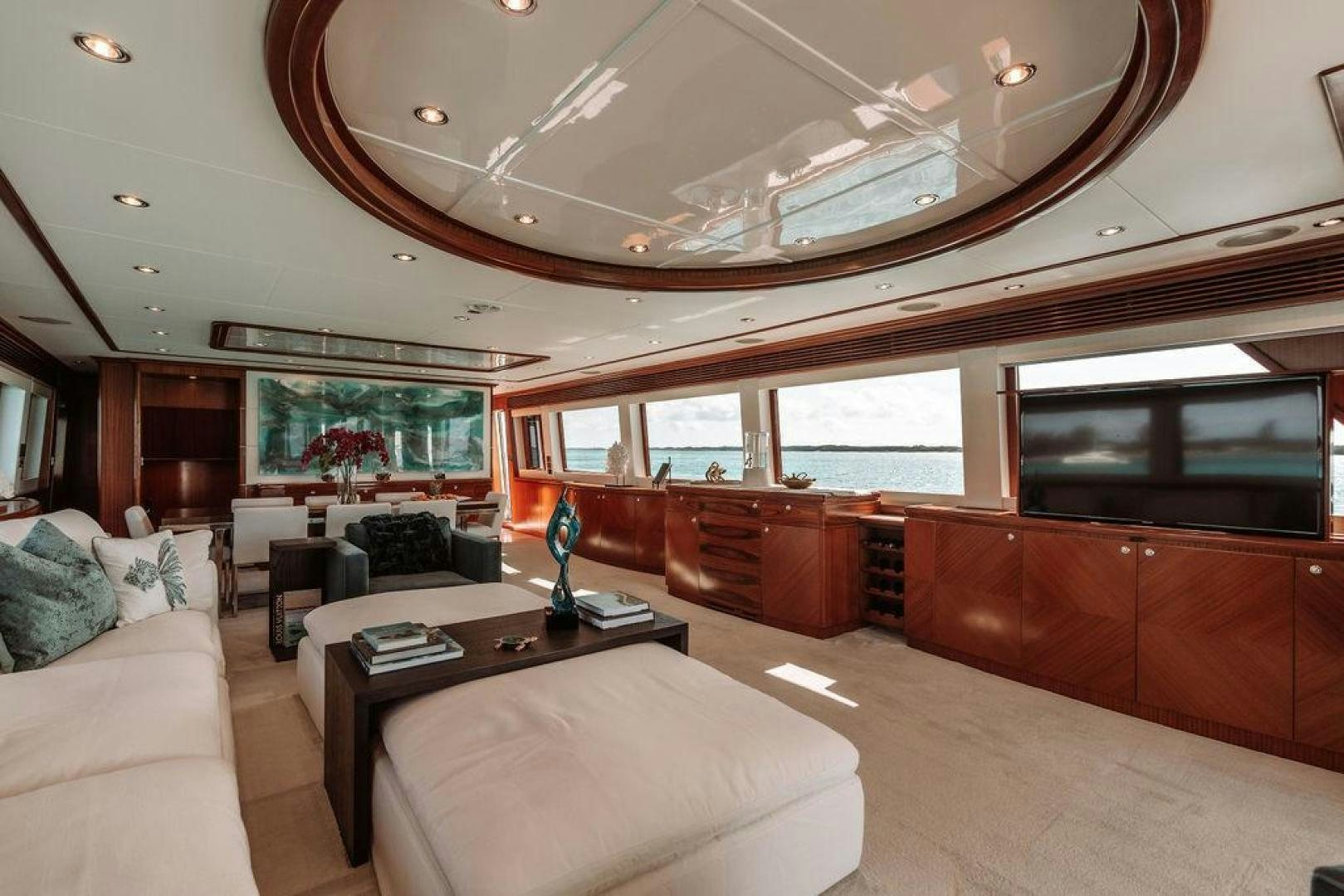 a living room with a large ceiling aboard BEACHFRONT Yacht for Sale