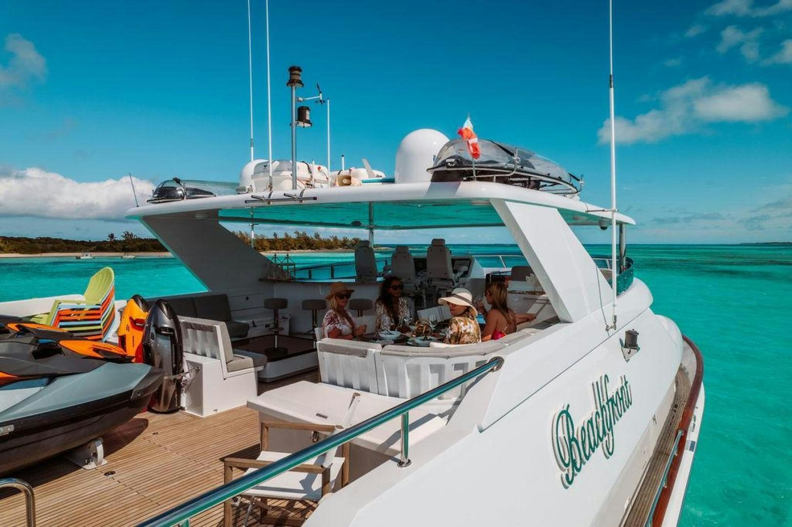 a group of people on a boat aboard BEACHFRONT Yacht for Sale
