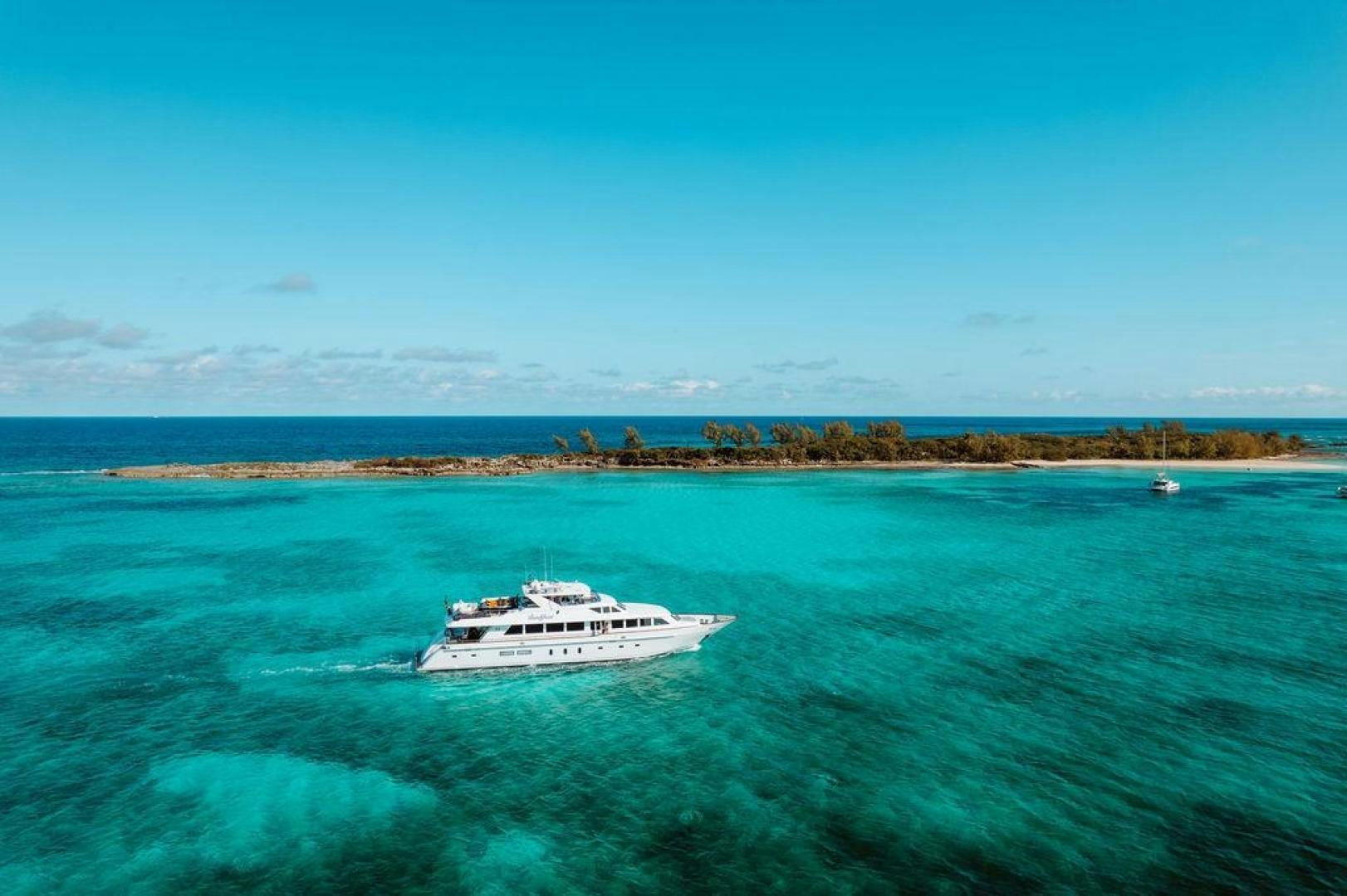 a boat in the water aboard BEACHFRONT Yacht for Sale