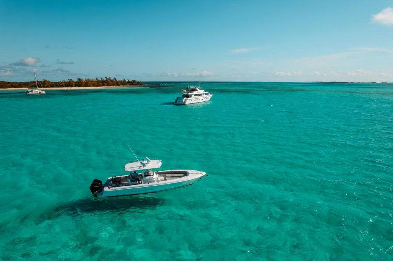 a couple of boats in the water aboard BEACHFRONT Yacht for Sale